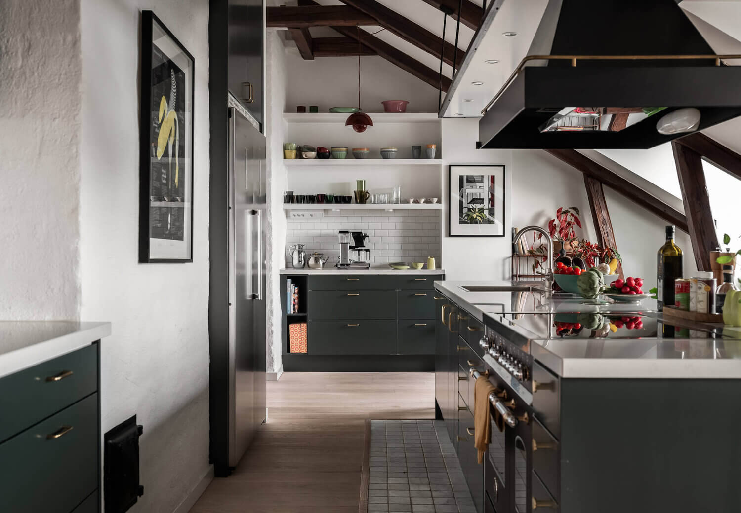 A Scandinavian Penthouse Apartment With A Dark Green Kitchen 9 green kitchen open shelves scandinavian penthouse nordroom1 A Scandinavian Penthouse Apartment With A Dark Green Kitchen