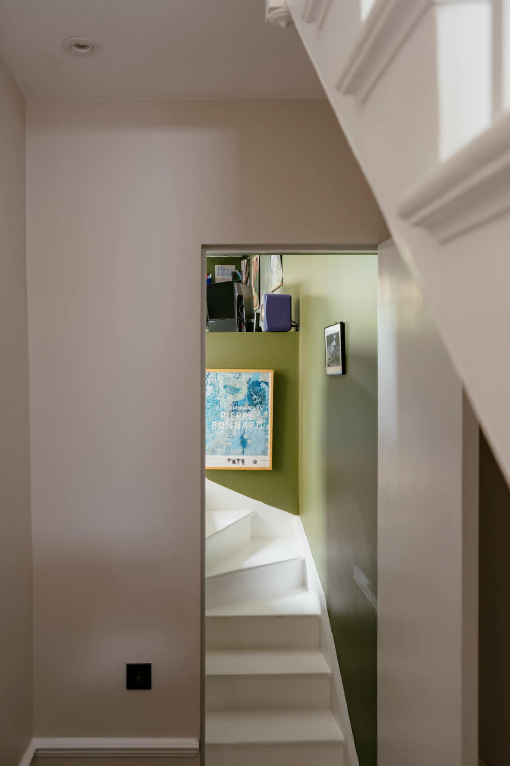 A Renovated Victorian Townhouse with a Small Split-Level Garden 9 green staircase