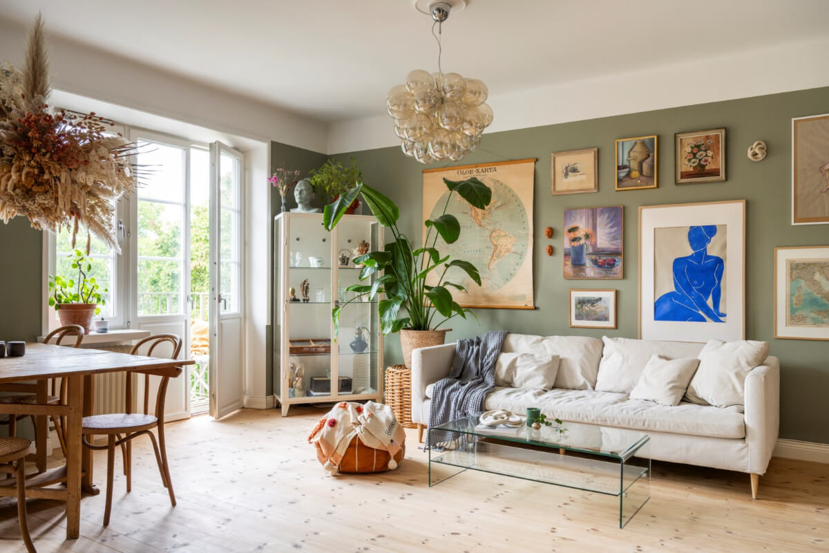 green walls living room wooden floorboards
