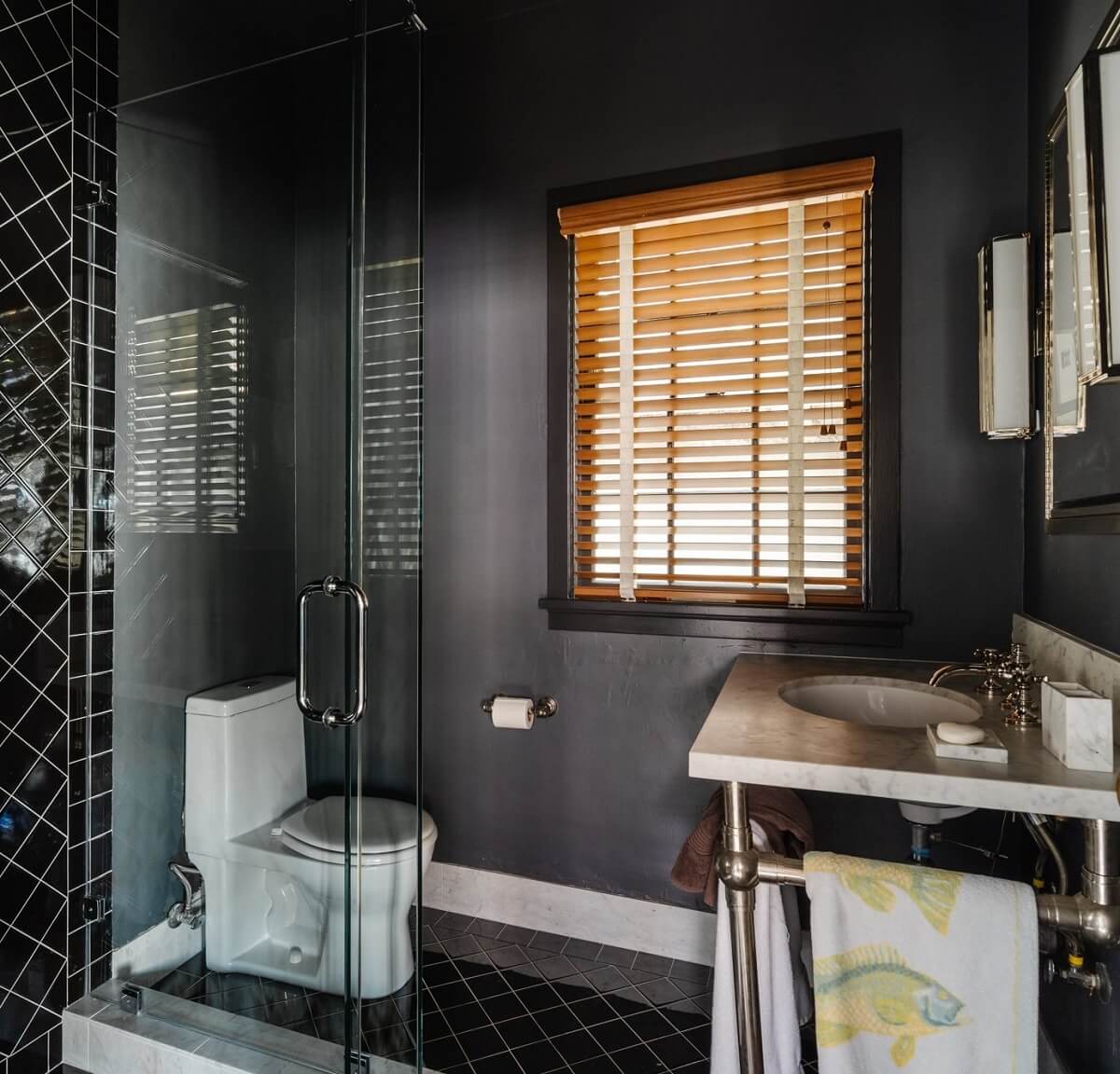 Moody, not Gloomy! Beautiful Dark Small Bathrooms 22 guest-house-bathroom-black-tiles-dark-gray-walls-nordroom
