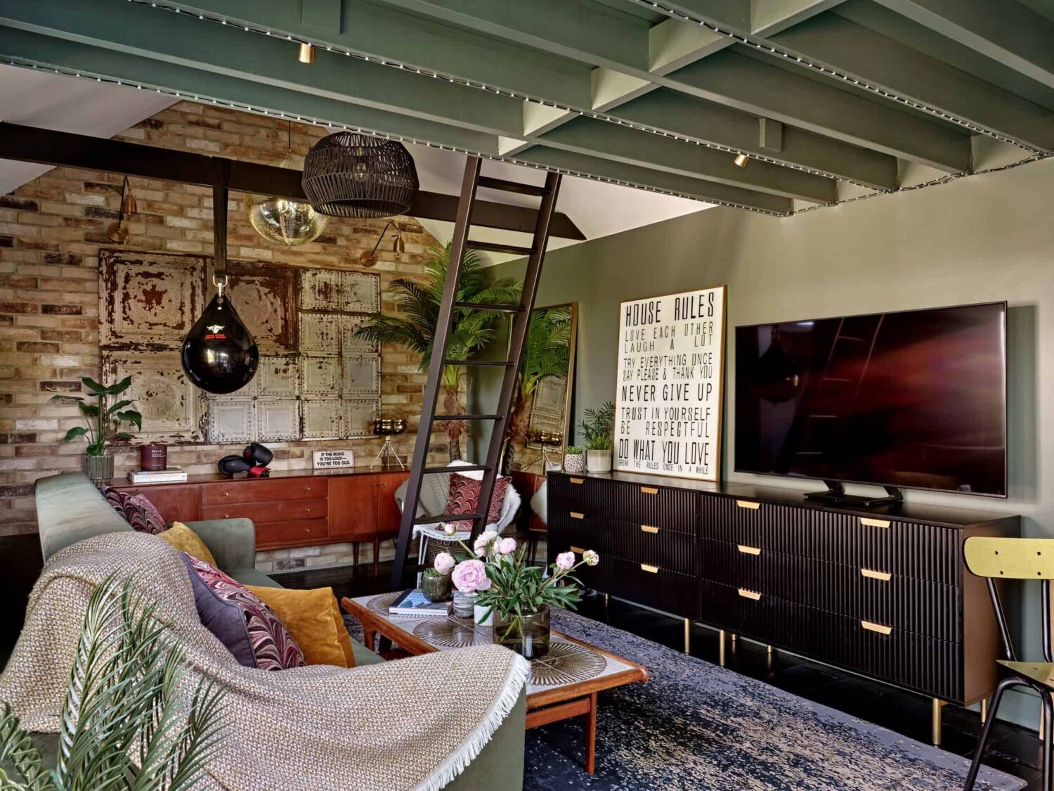 Pink & Gray Rooms in a Victorian Home with a Guest House 24 guest house living room with painted wooden ceiling and exposed brick wall