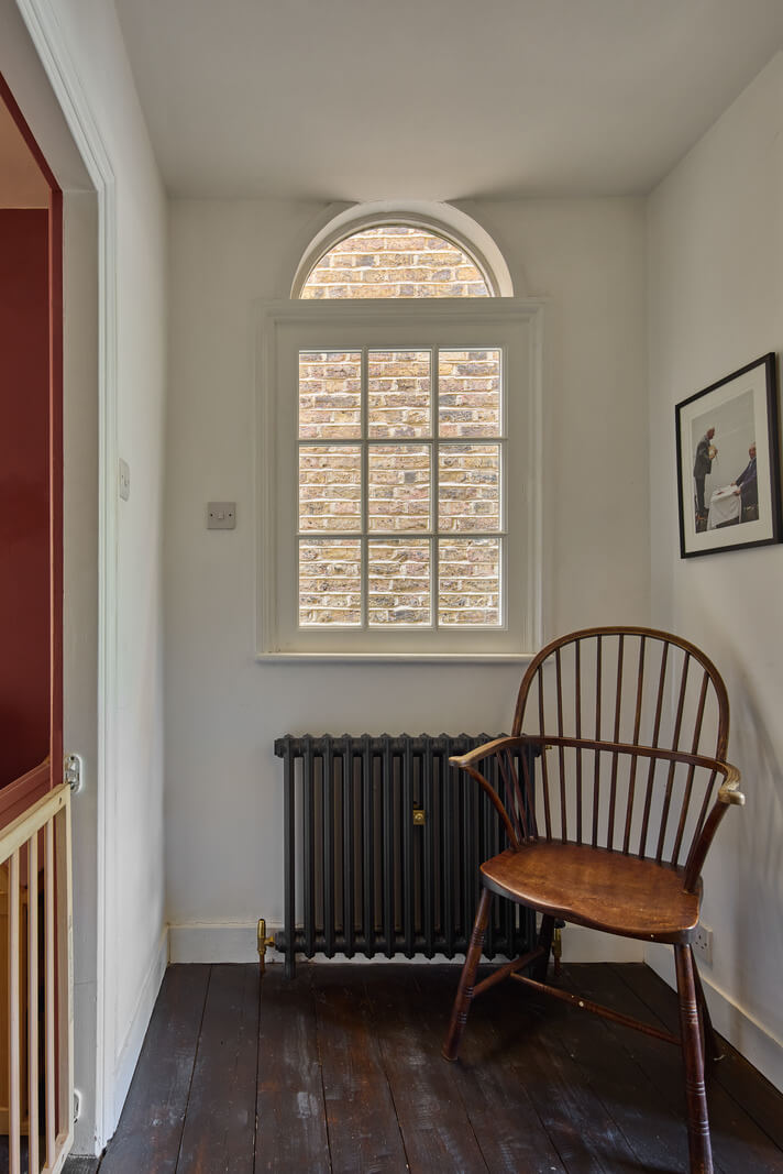 A 19th Century London Cottage with a Stunning Kitchen Extension 13 hall black wooden floorboards