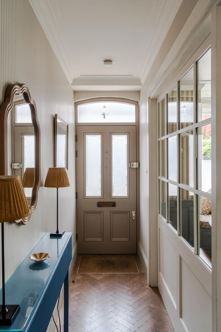 Color, Pattern, and Texture in a Renovated London Townhouse 11 hall herringbone floor striped wallpaper