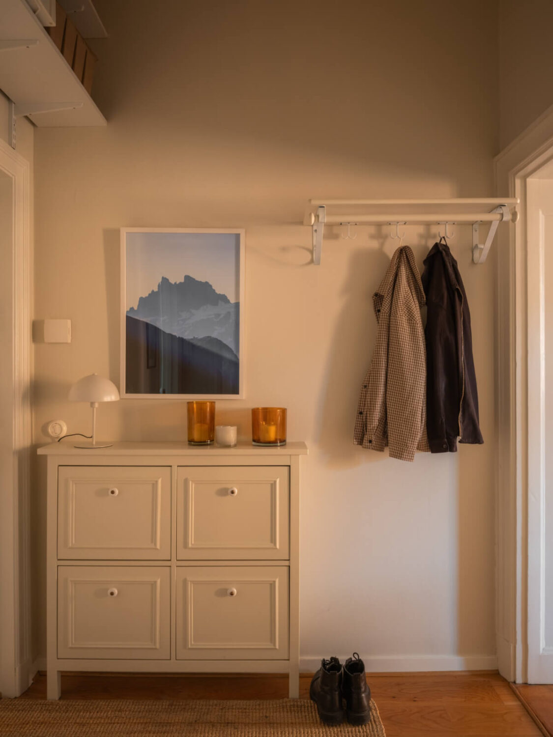 A 19th Century Apartment with a Dark Glass Room Divider 13 hall shelves above door A 19th Century Apartment with a Dark Glass Room Divider
