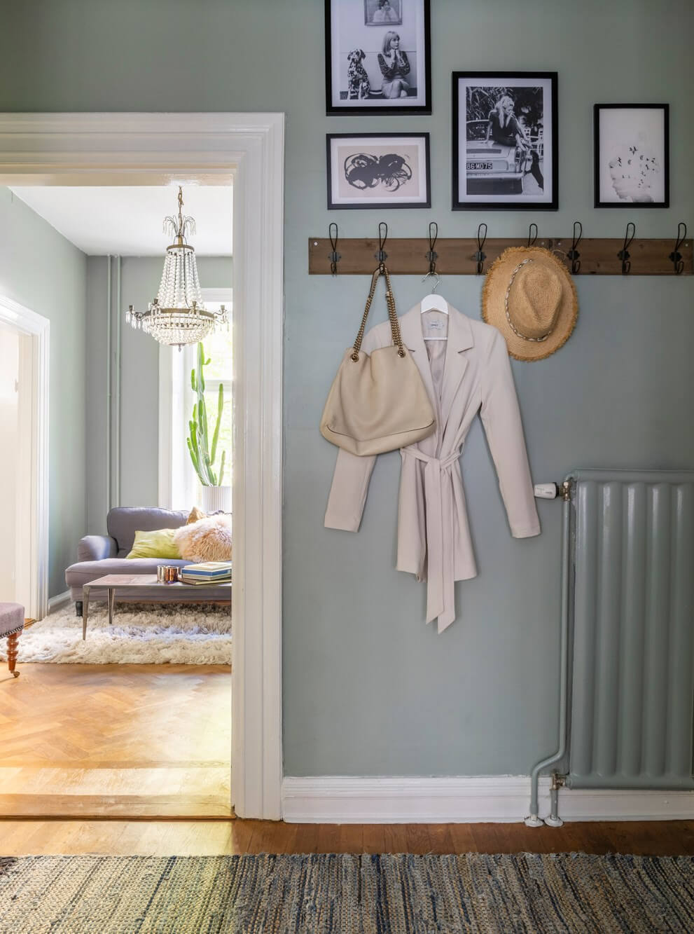 Classic Proportions and a Charming Kitchen in a Malmö Apartment 15 hall with coat hooks