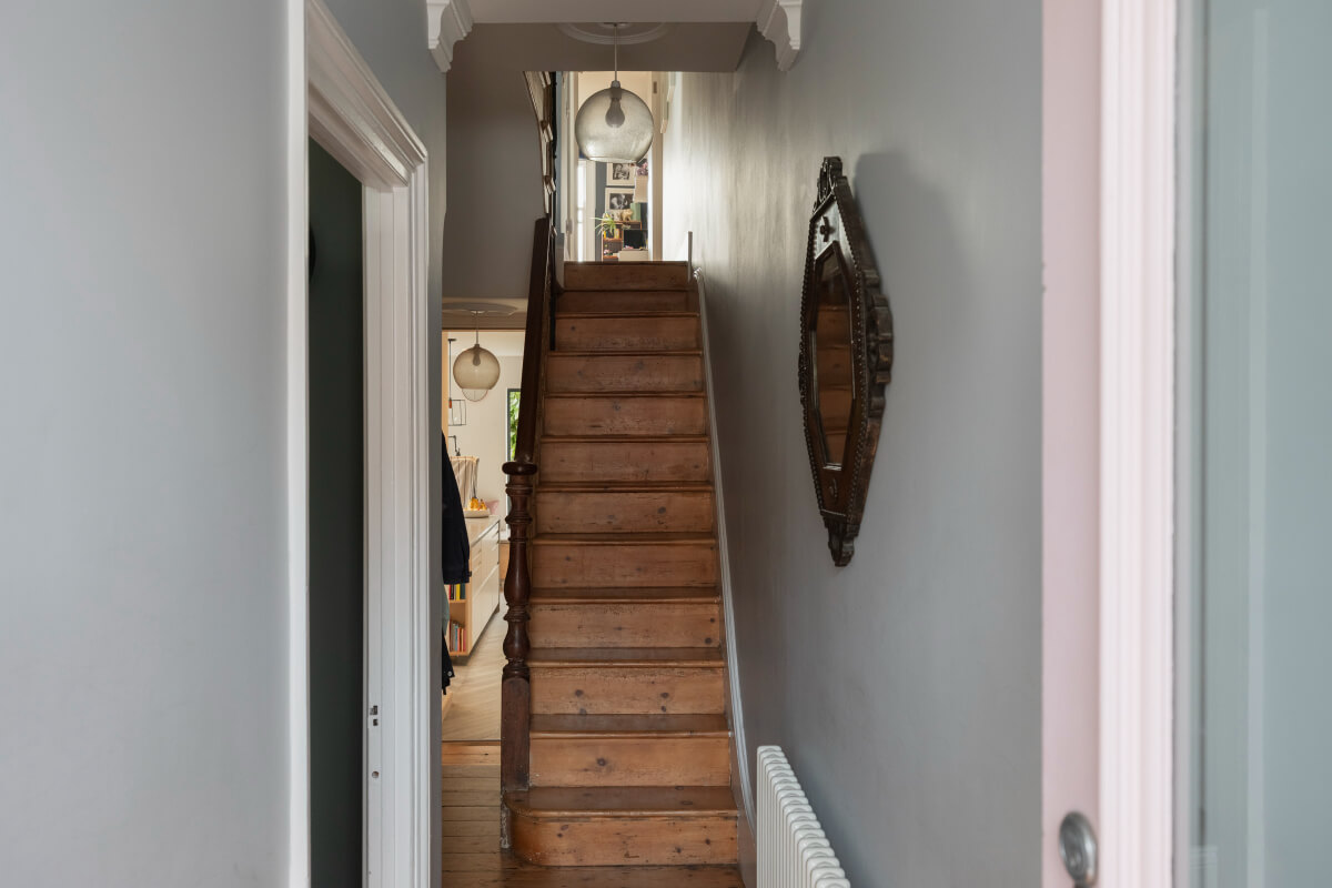 Exposed Brick and Wooden Beams in an Extended London Home 20 hall wooden staircase
