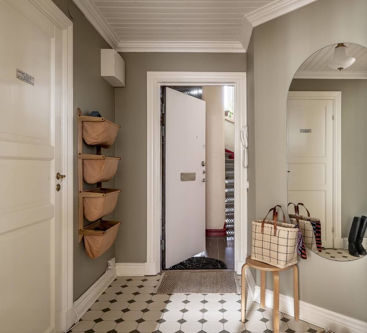 Stylish Small Entryway Ideas with Smart Storage Solutions 20 hallway-gray-walls-baskets-black-white-tile-floor-nordroom