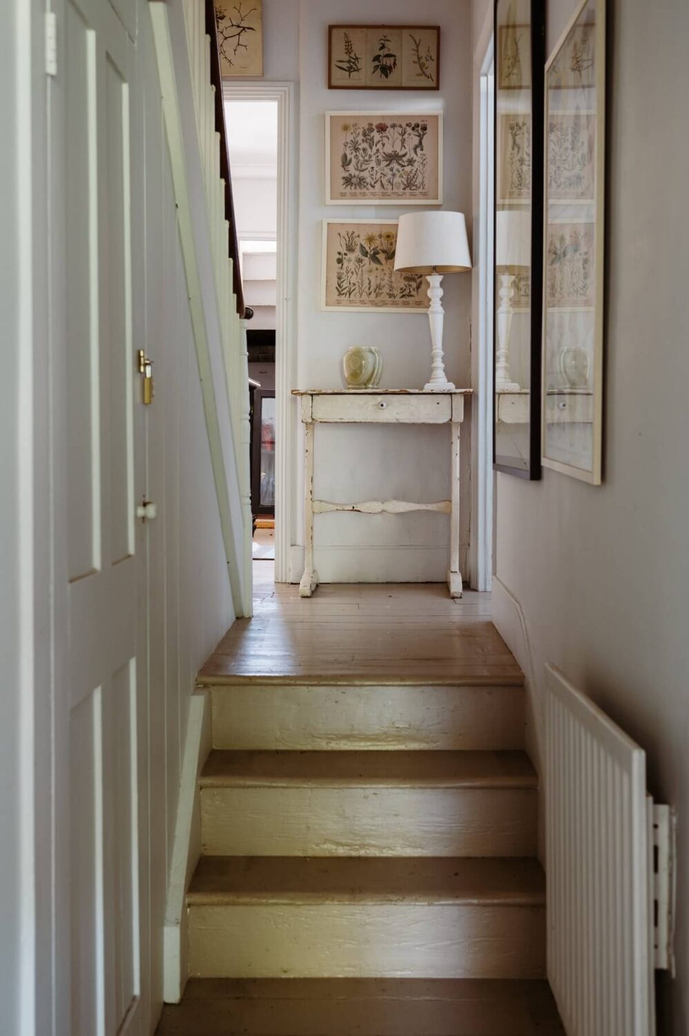 A Cozy Victorian House with Warm Color Accents 11 hallway-staircase