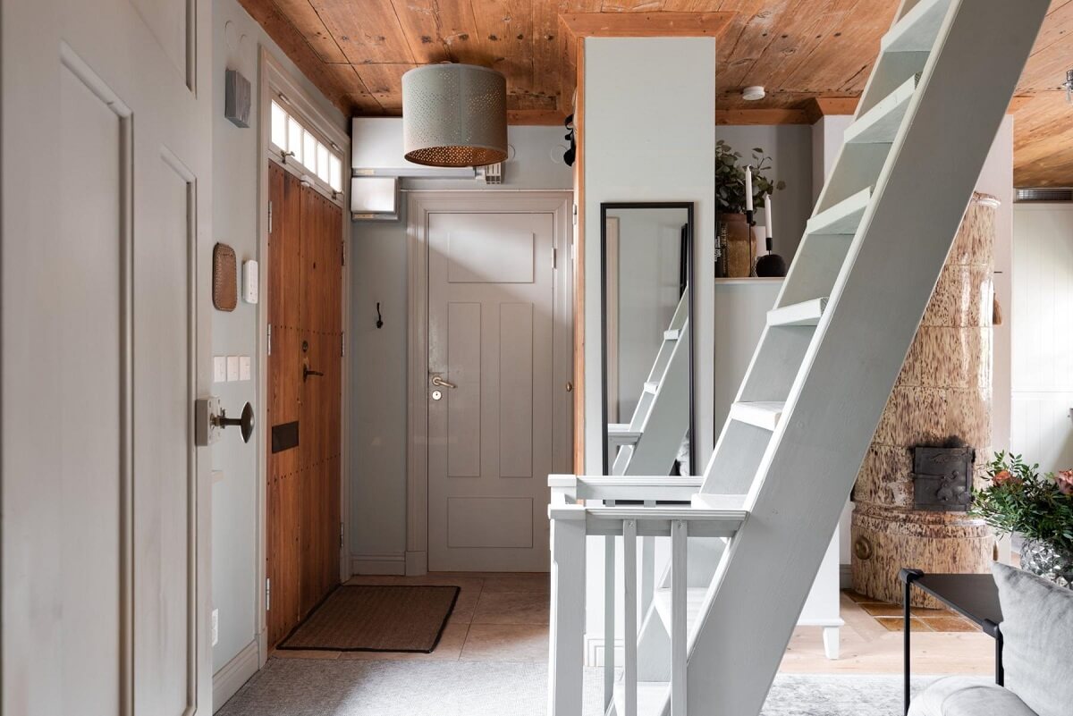 hallway tiny swedish house wooden ceiling