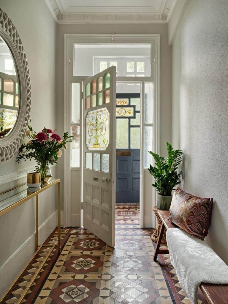 Pink & Gray Rooms in a Victorian Home with a Guest House 19 hallway with victorian floor tiles and bench