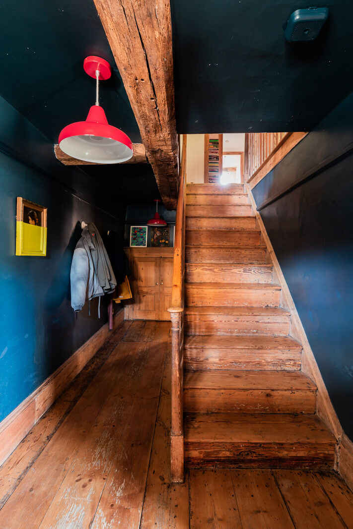 Rustic Wooden Elements in a Historic English House 15 hallway wooden floor dark blue walls ceiling
