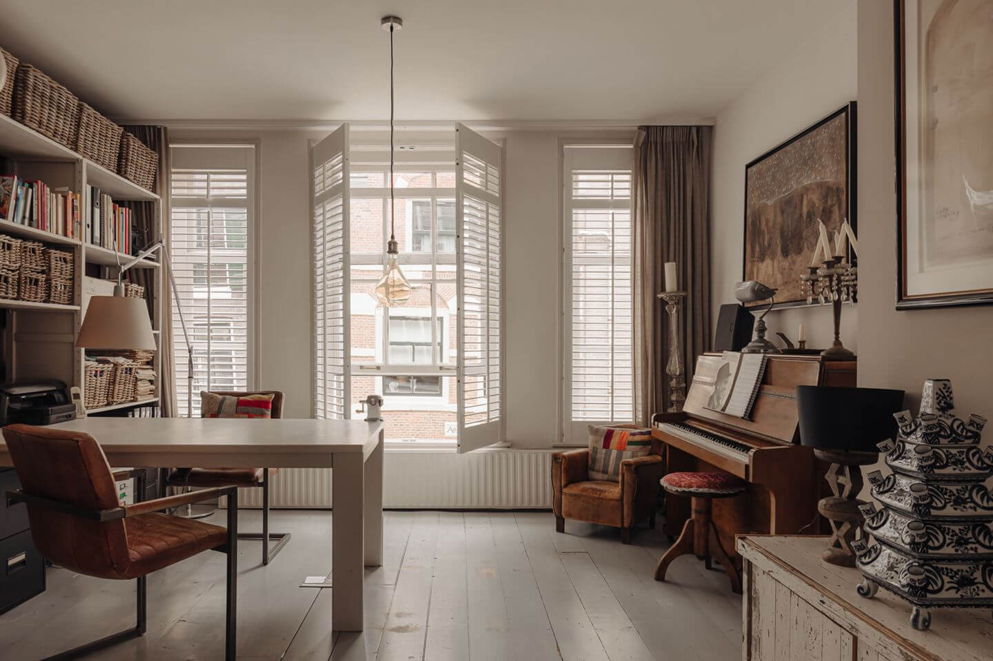 A Charming Amsterdam Townhouse with a Cozy Roof Terrace 10 home office with bookcases