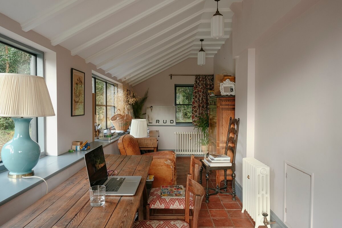 A Barn House with Vintage Decor and Exposed Beams 19 home office with large wooden table