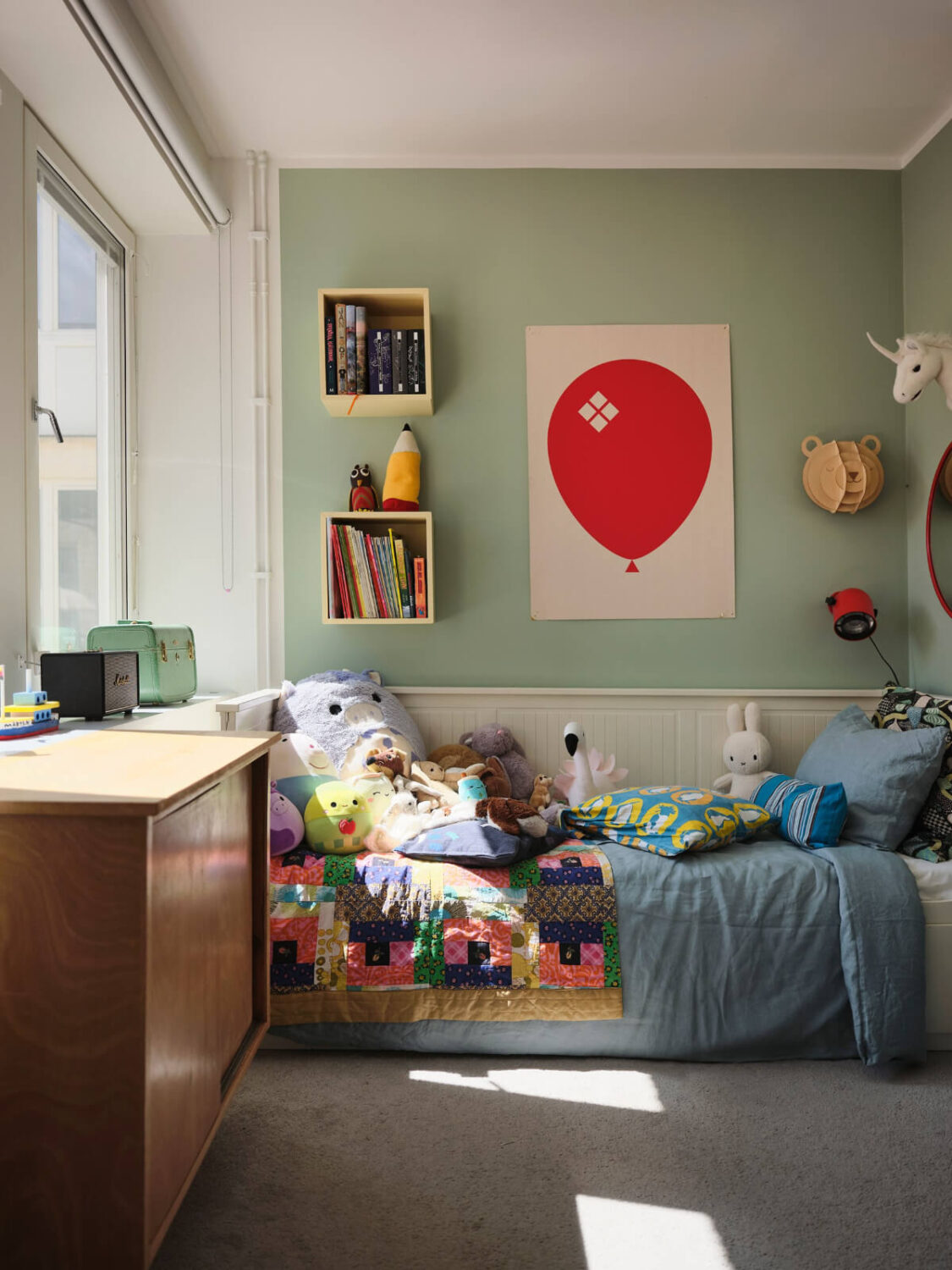 A Bright Family Apartment in a 1950s School Building 21 kids bedroom light green walls