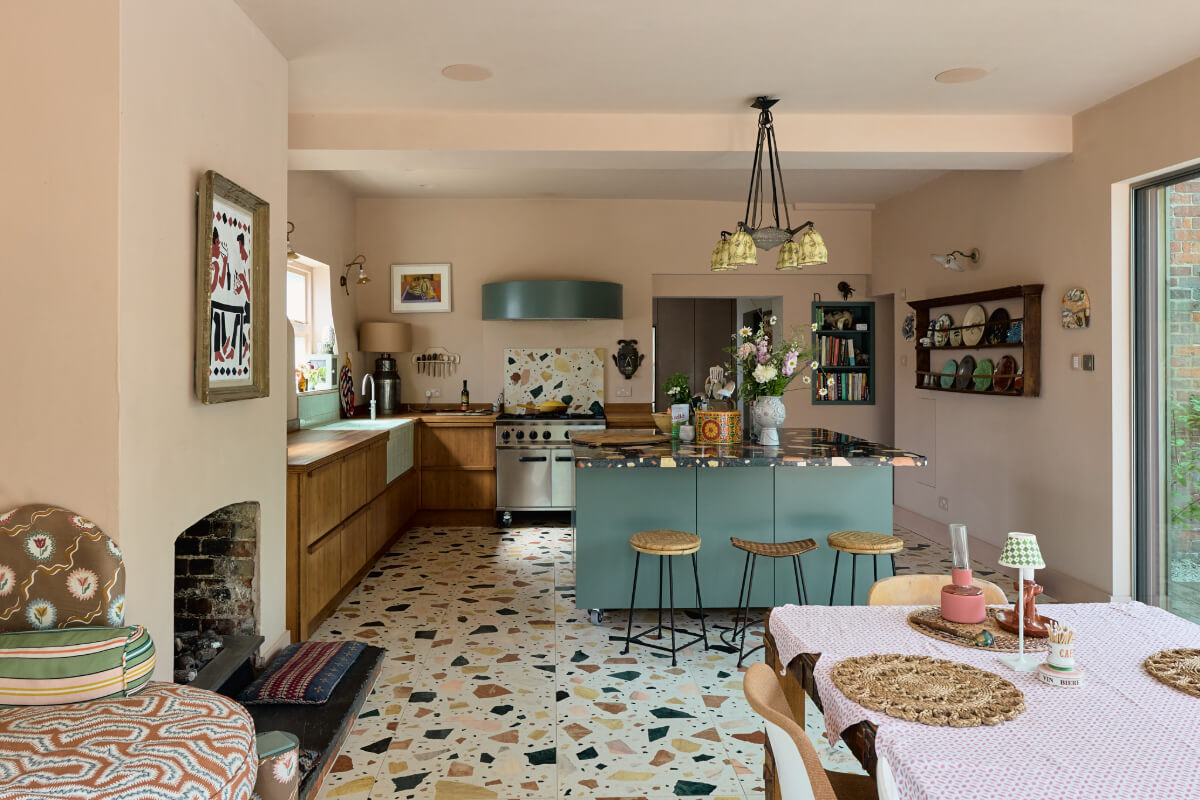 kitchen and dining space terrazzo floor tiles fireplace
