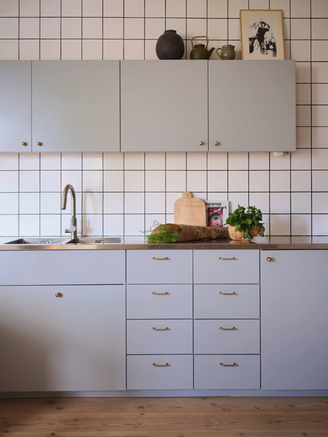 A Bright Family Apartment in a 1950s School Building 7 kitchen detail stainless steel countertop