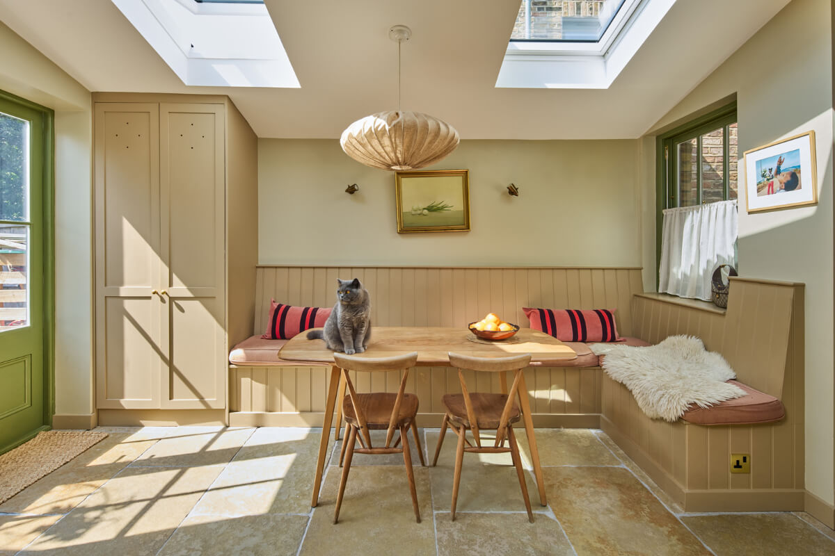A 19th Century London Cottage with a Stunning Kitchen Extension 9 kitchen dining space built-in wooden bench