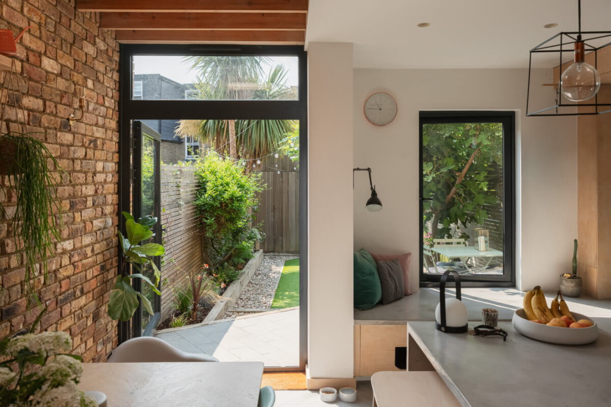 Exposed Brick and Wooden Beams in an Extended London Home 13 kitchen extension glass doors to garden