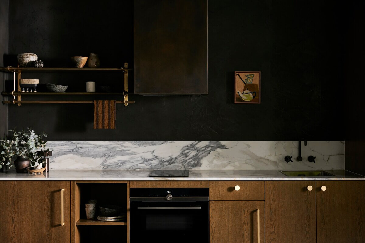 The River Studio: Moody Tones and Luxury in an Australian Airbnb 2 kitchen-marble-worktop-black-walls-airbnb-apartment-victoria-australia-nordroom