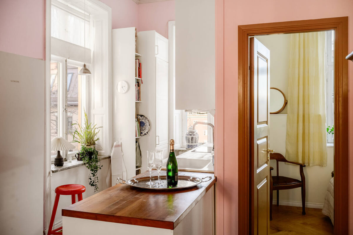 A Pink Living Room in a Light-Filled Stockholm Apartment 8 kitchen pink walls