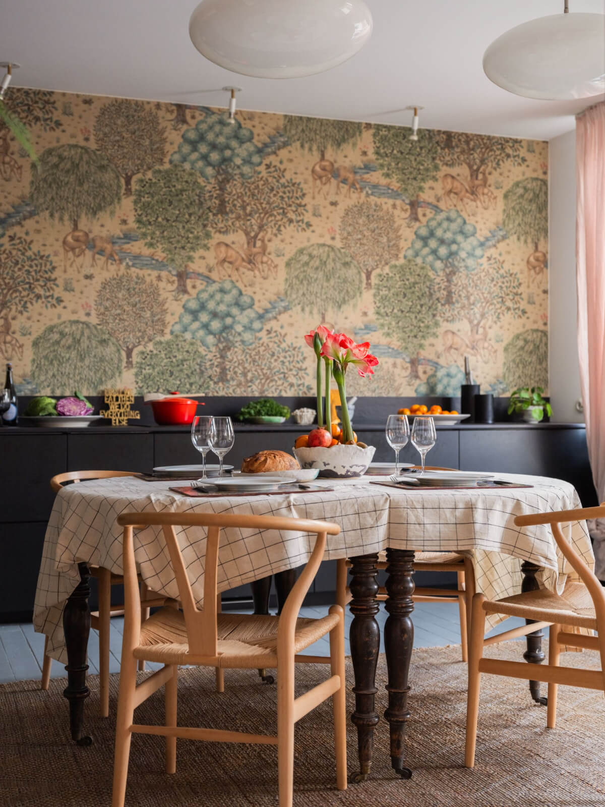kitchen sleek black cabinets and william morris wallpaper