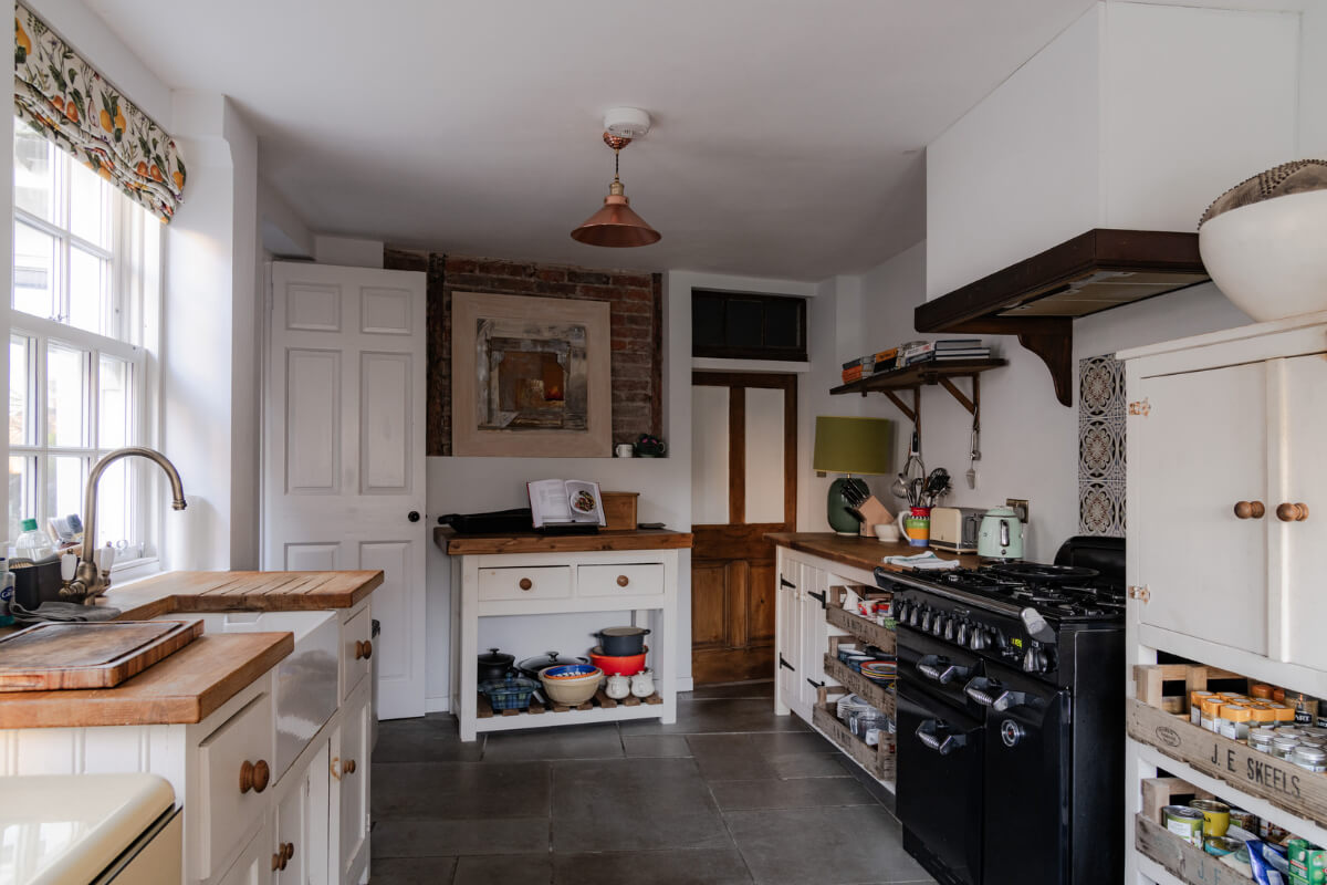 A Georgian English House Restored To Its Former Glory 8 kitchen stone floor lemon curtains