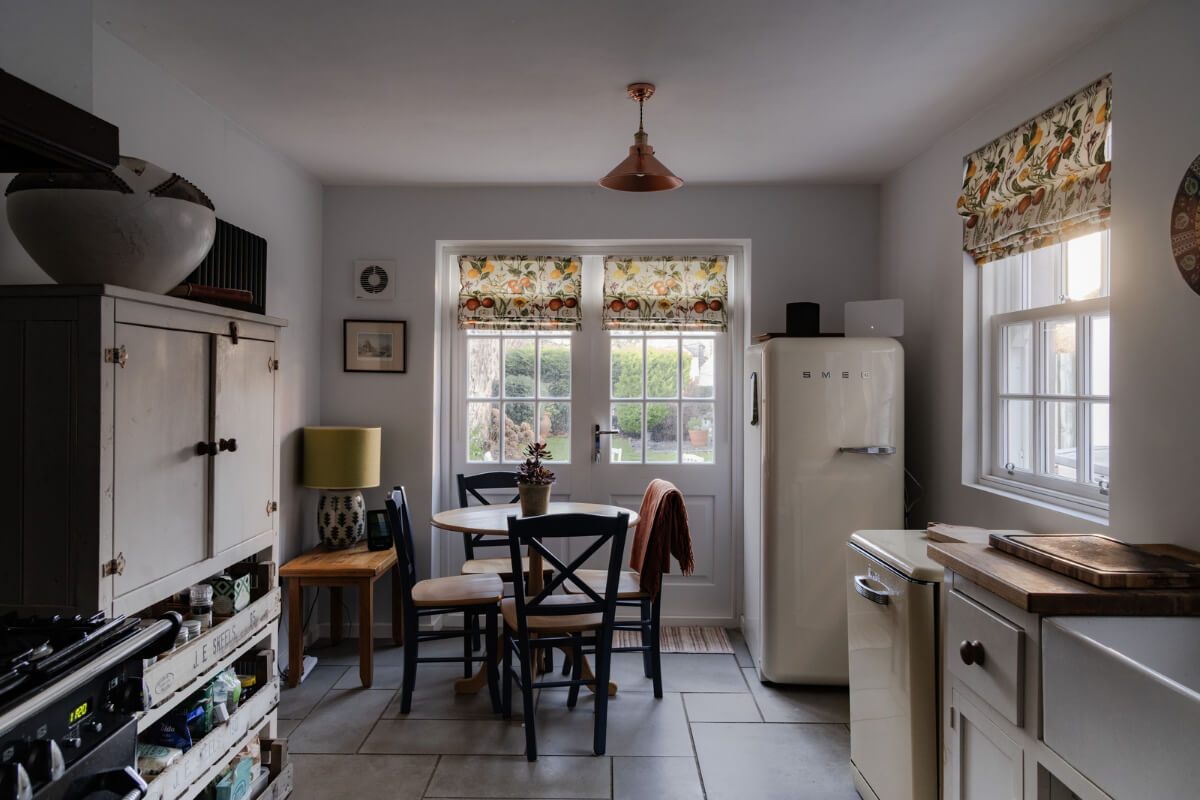A Georgian English House Restored To Its Former Glory 9 kitchen stone floor round wooden table