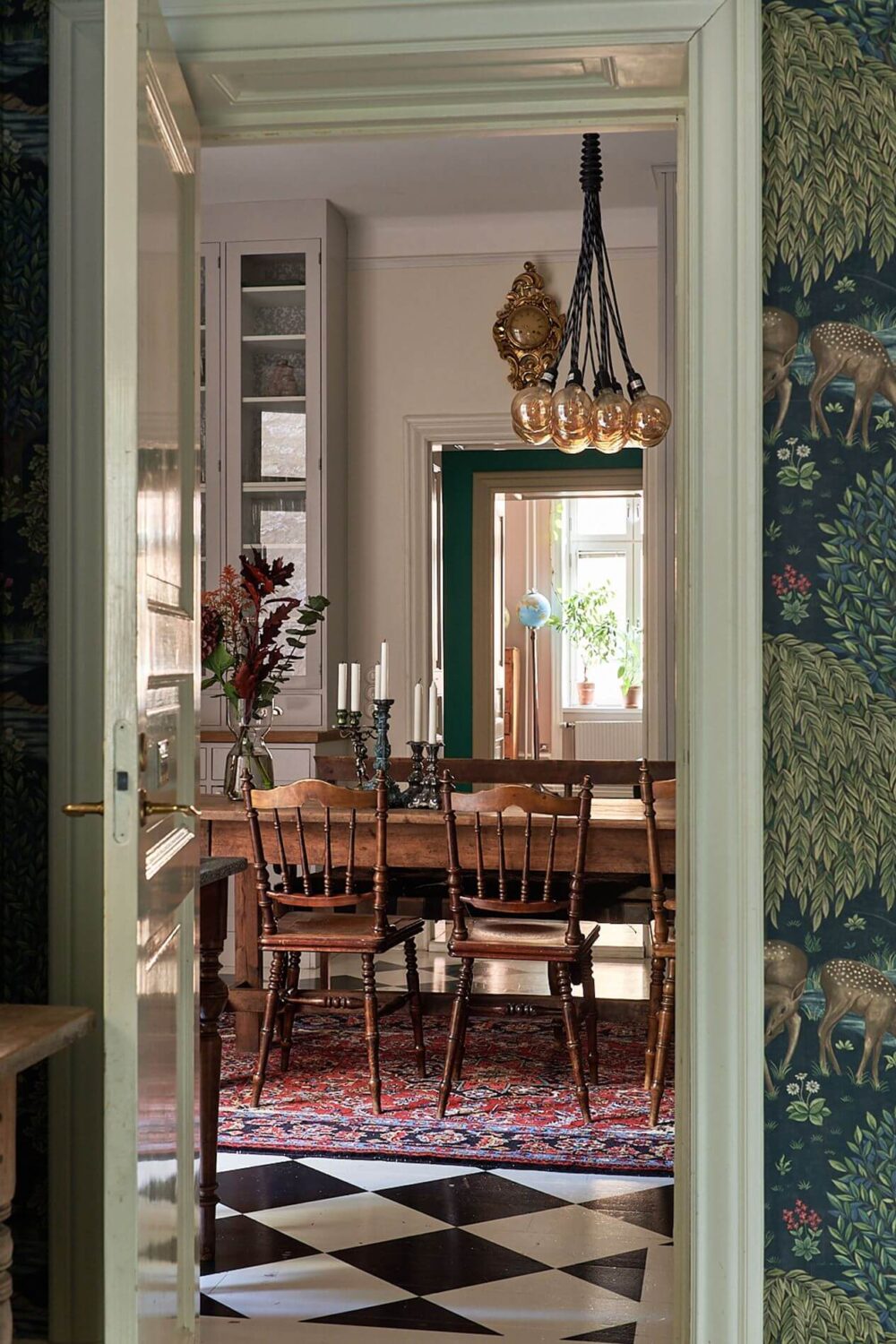 kitchen-view-rustic-wooden-dining-table-checkerboard-floor-nordroom