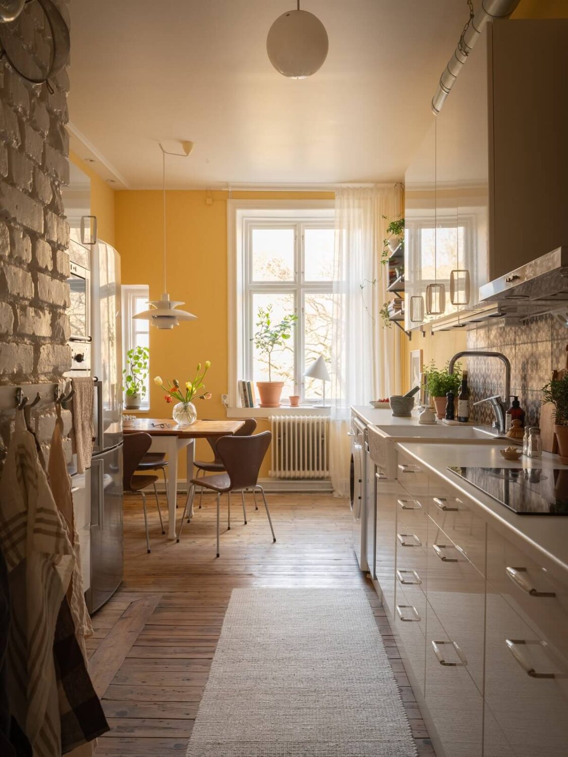 Yellow Kitchen Design Ideas (with Paint Colors) 54 kitchen with yellow painted walls