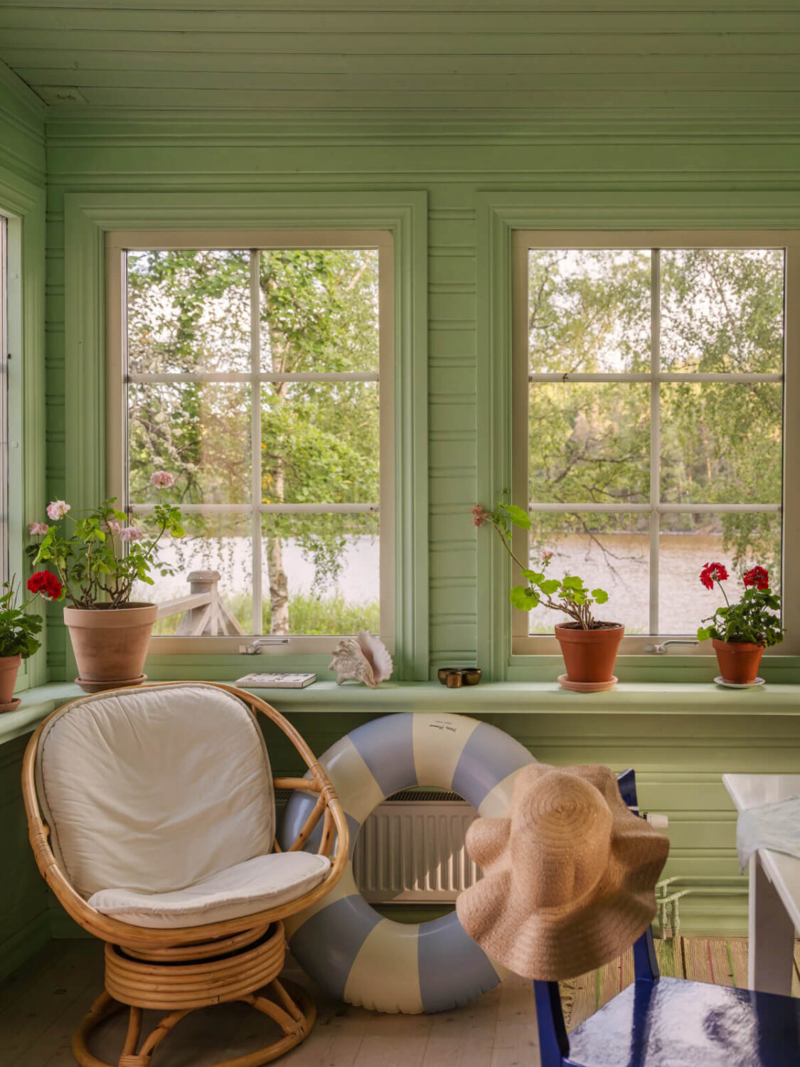 A 1930s Lakeside Country House with a Private Beach 5 lake view garden room