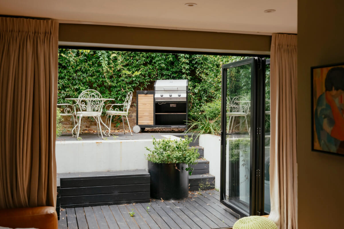 A Renovated Victorian Townhouse with a Small Split-Level Garden 16 large glass doors garden