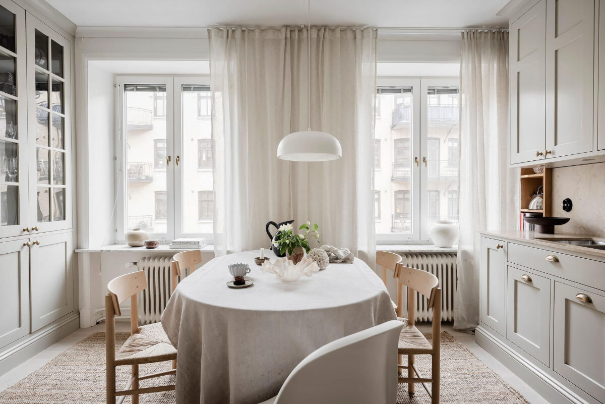 A Light Corner Apartment with an Open Flowing Floor Plan 3 large kitchen table