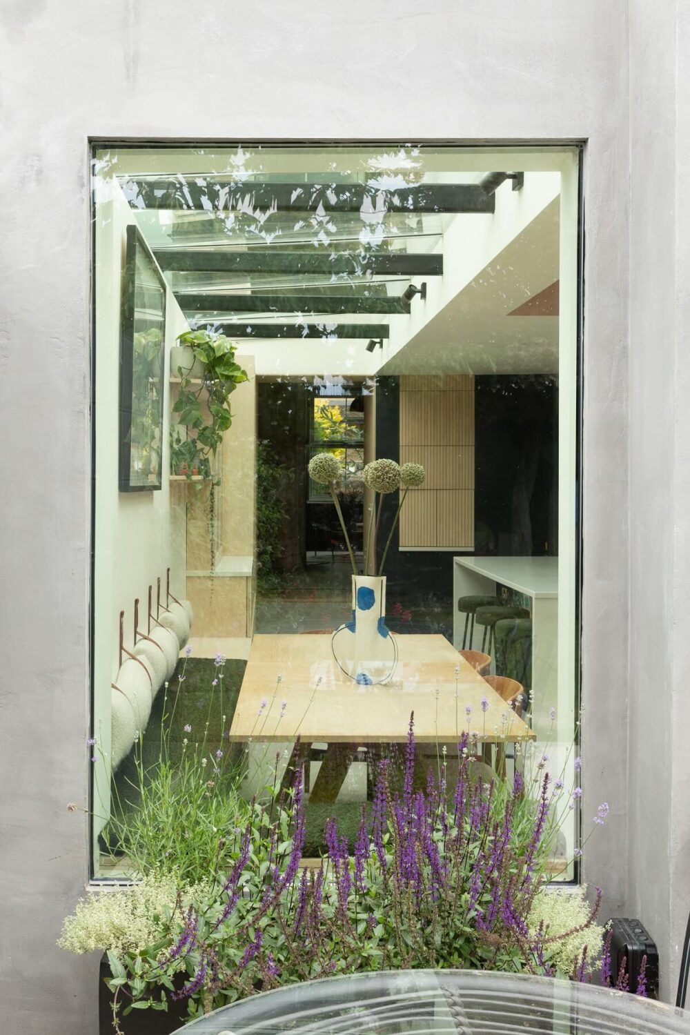 A London Family Home with a Light Modern Extension 9 large window with kitchen dining table