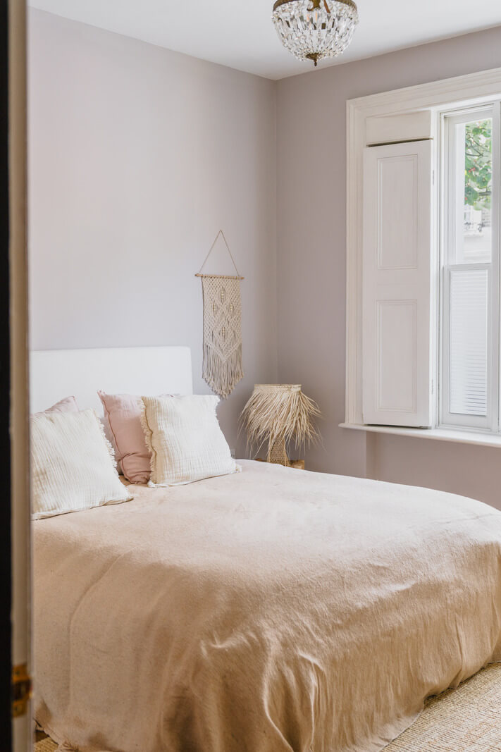 A Charming One-Bedroom Apartment with a Courtyard Terrace 9 light bedroom with gray walls and white shutters
