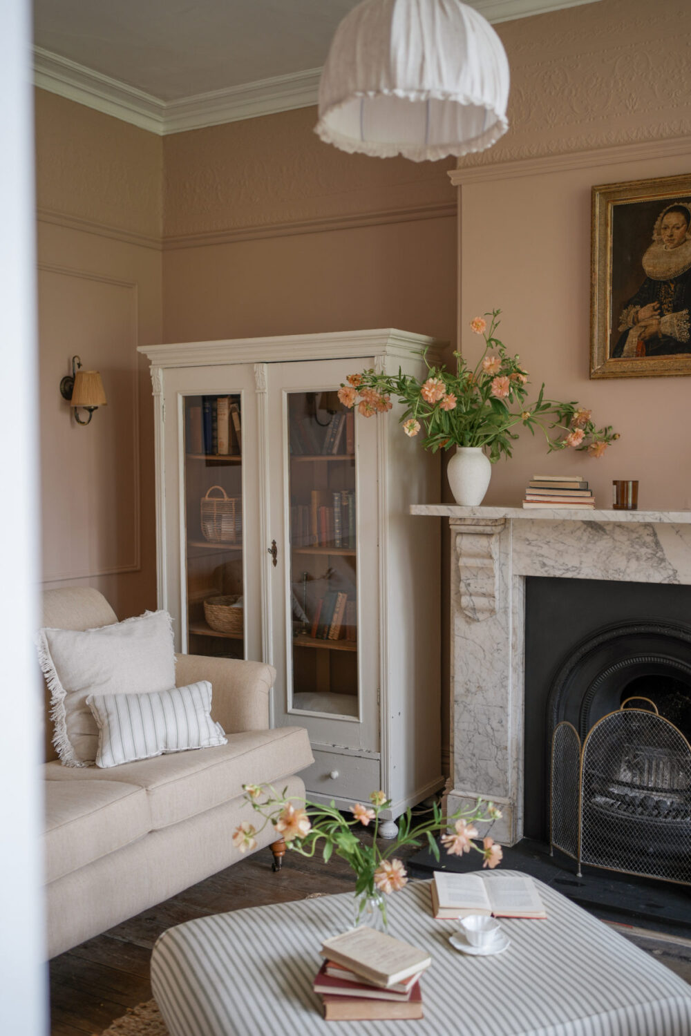 Pantone Color of the Year 2025: Mocha Mousse Interior Inspiration 29 light brown living room with marble fireplace Pantone Color of the Year 2025: Mocha Mousse Interior Inspiration