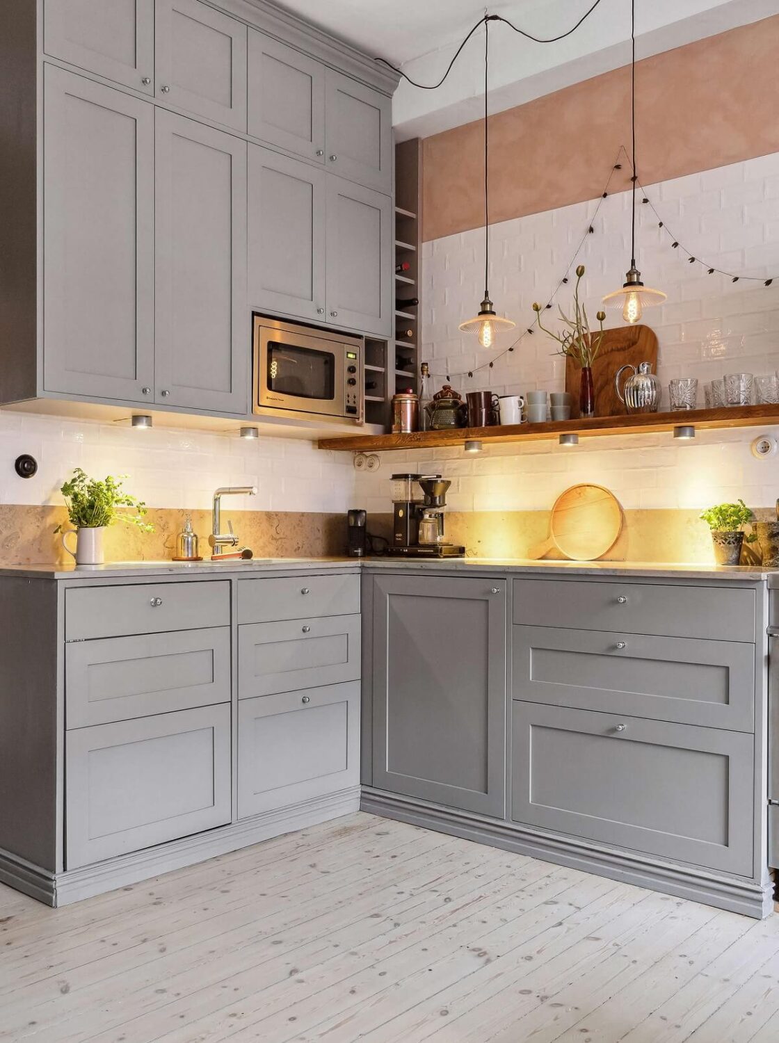 A Swedish Apartment with a Lovely Kitchen 4 light-gray-kitchen-pink-wall-nordroom