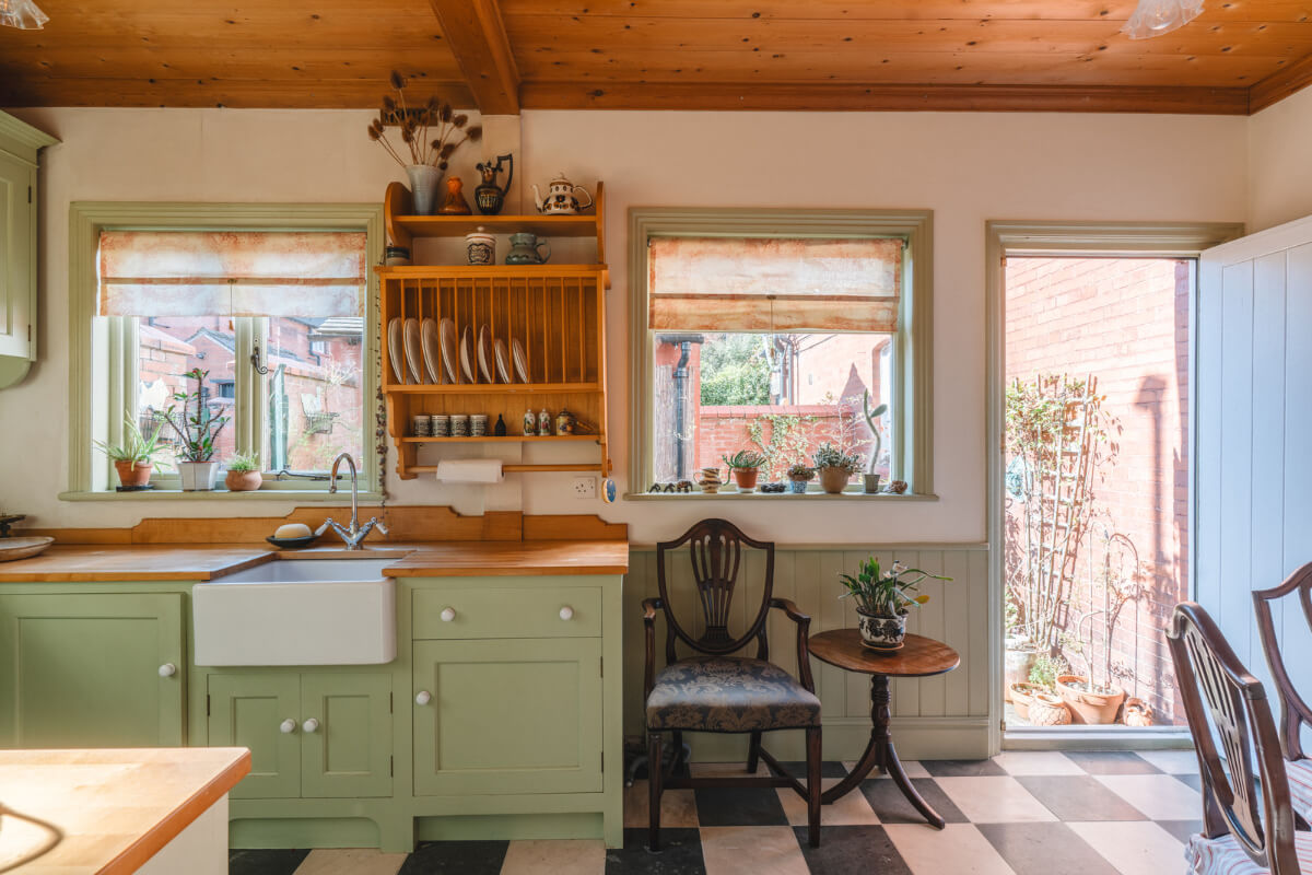 A Sage Green Kitchen in a Charming Arts and Crafts House 6 light green cottage kitchen