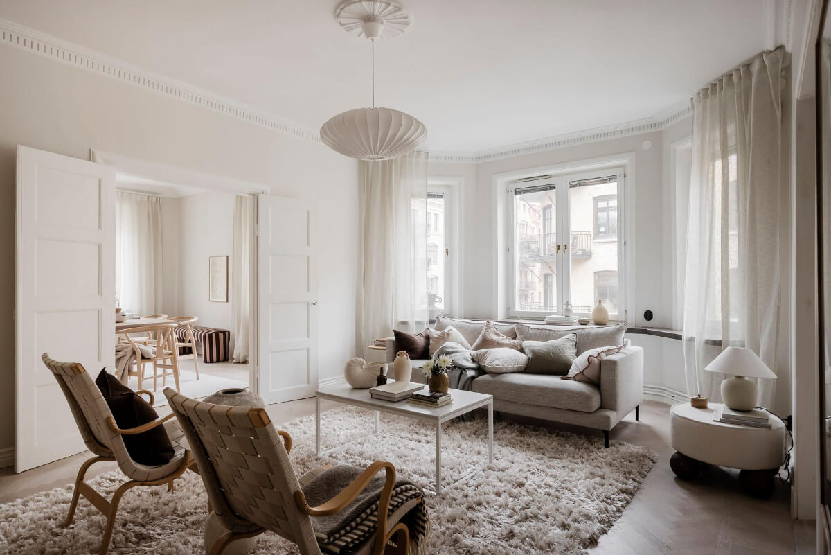 A Light Corner Apartment with an Open Flowing Floor Plan 17 light living room bay window