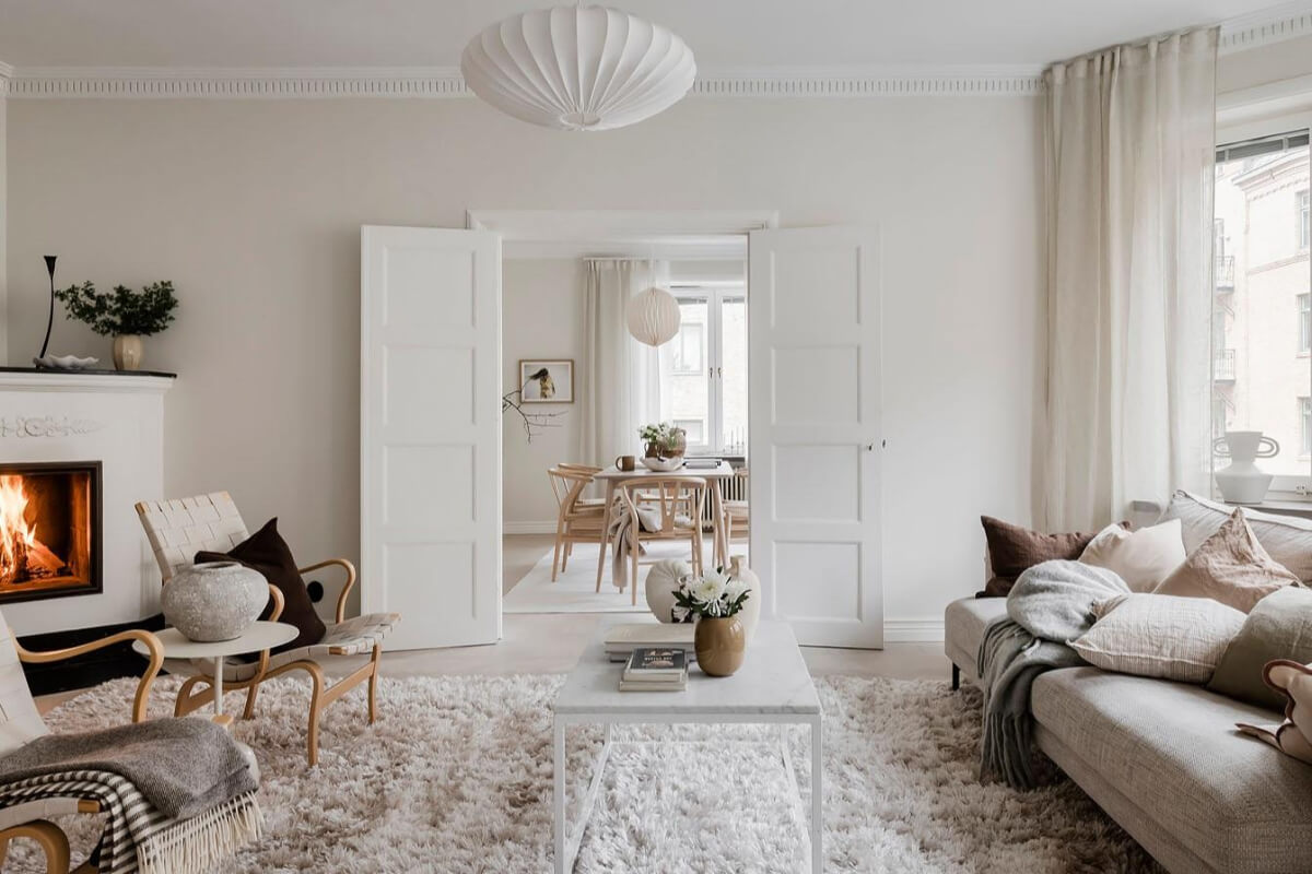 A Light Corner Apartment with an Open Flowing Floor Plan 13 light living room with fireplace