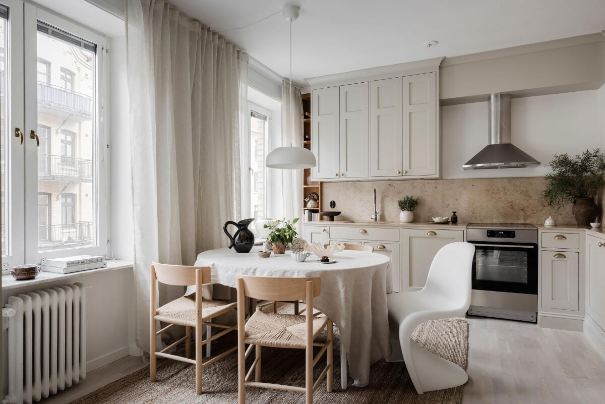 A Light Corner Apartment with an Open Flowing Floor Plan 5 light neutral kitchen