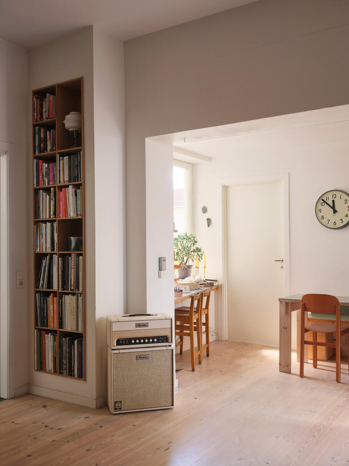 A Bright Family Apartment in a 1950s School Building 9 light open kitchen dining space