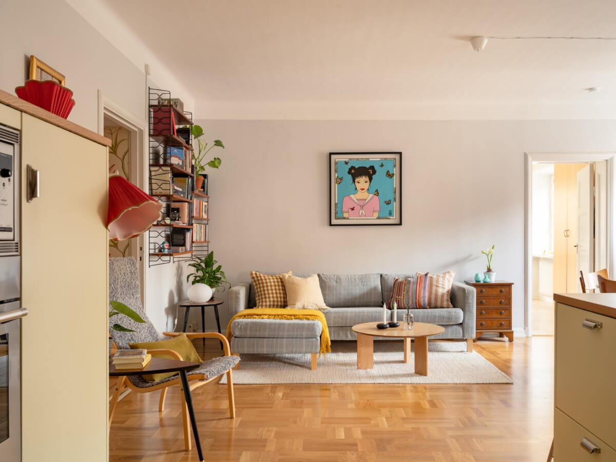 A Light Corner Apartment with a Pale Yellow Kitchen 8 light scandi living room parquet floor