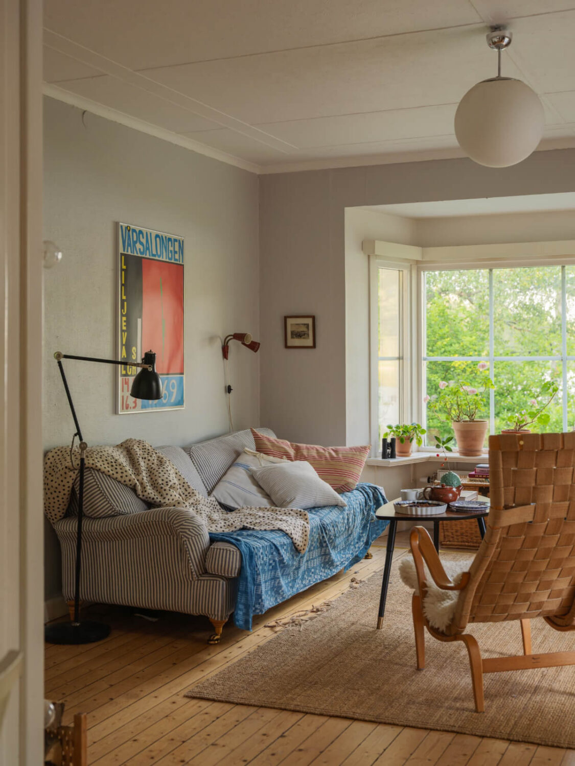 A 1930s Lakeside Country House with a Private Beach 18 living room bay window