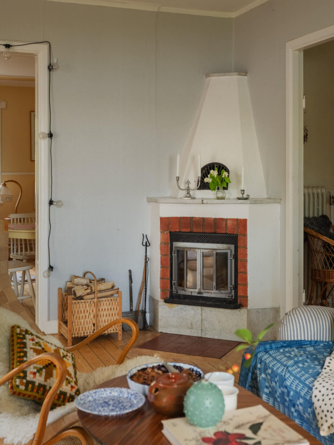 A 1930s Lakeside Country House with a Private Beach 21 living room corner fireplace