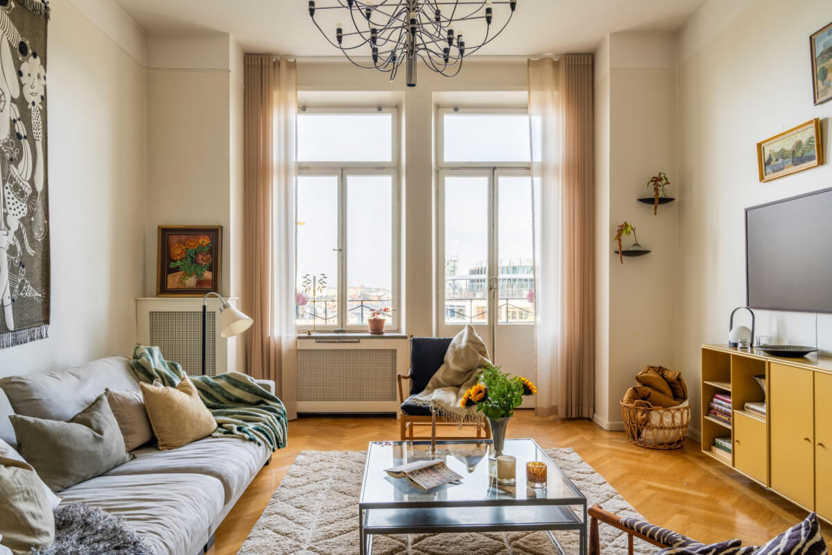 A Late 19th-Century Apartment with a Pink Bedroom 2 living room large windows herringbone parquet floor