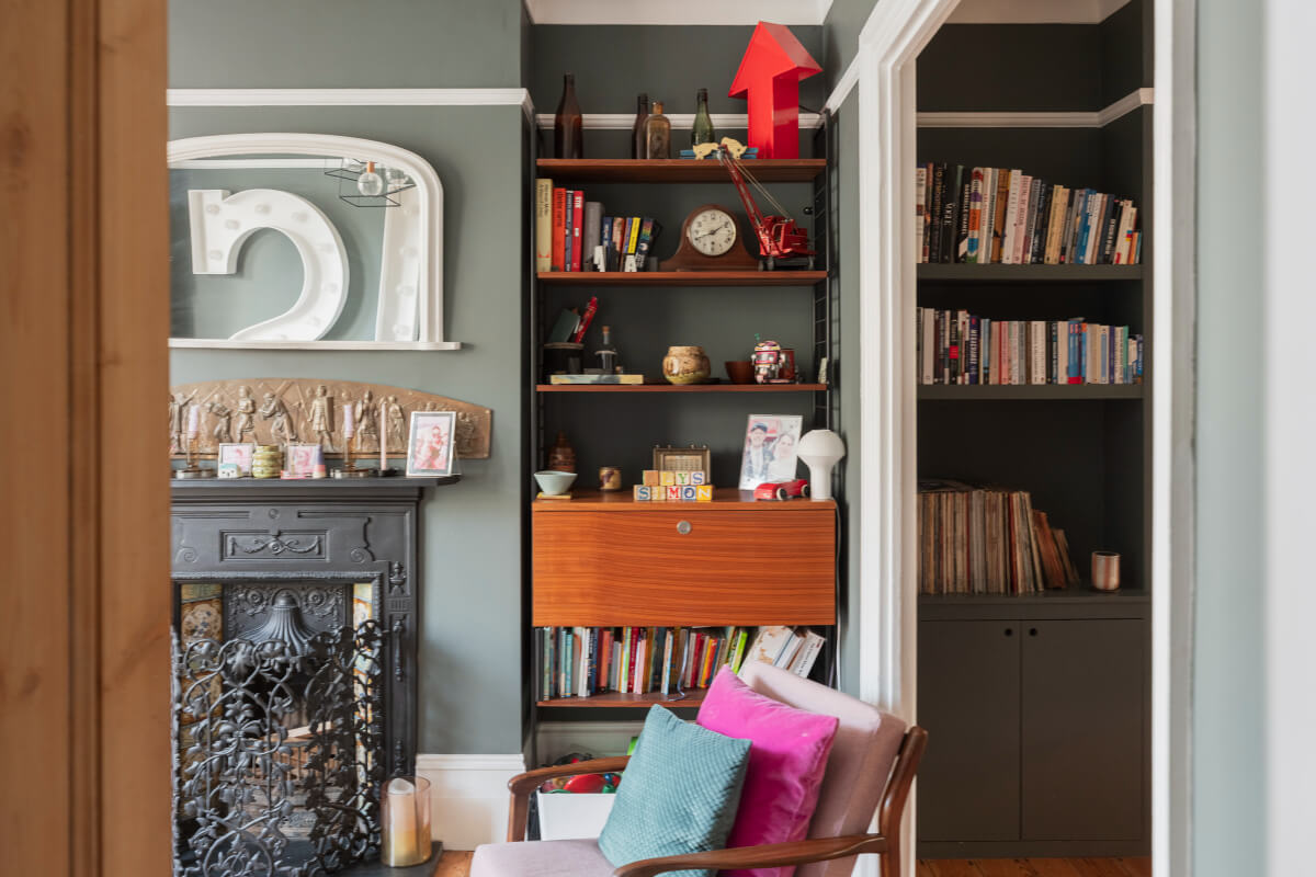 Exposed Brick and Wooden Beams in an Extended London Home 4 living room niche bookcase