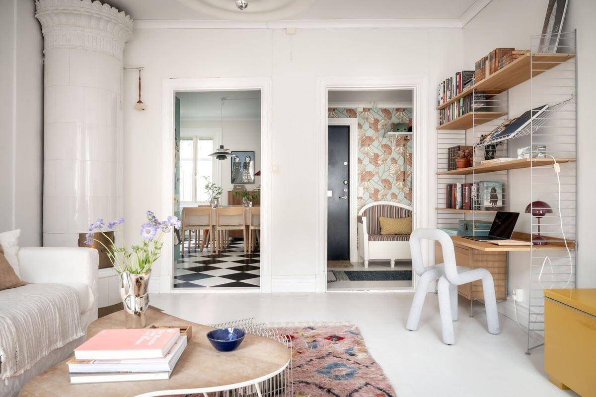 living room string shelves fireplace