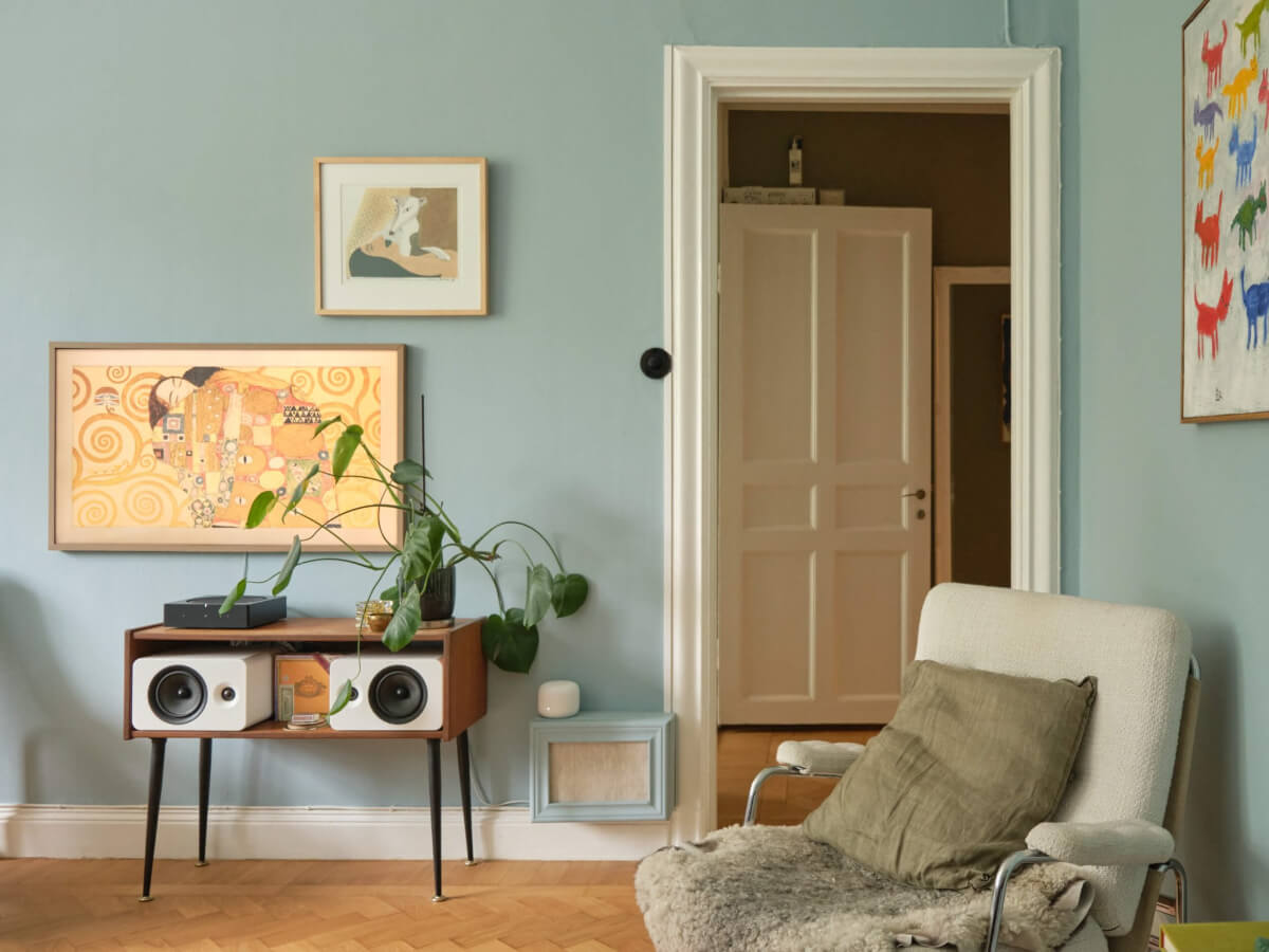 A Beautiful Color Palette and Historic Elements in a Stockholm Apartment 9 living room view into hall