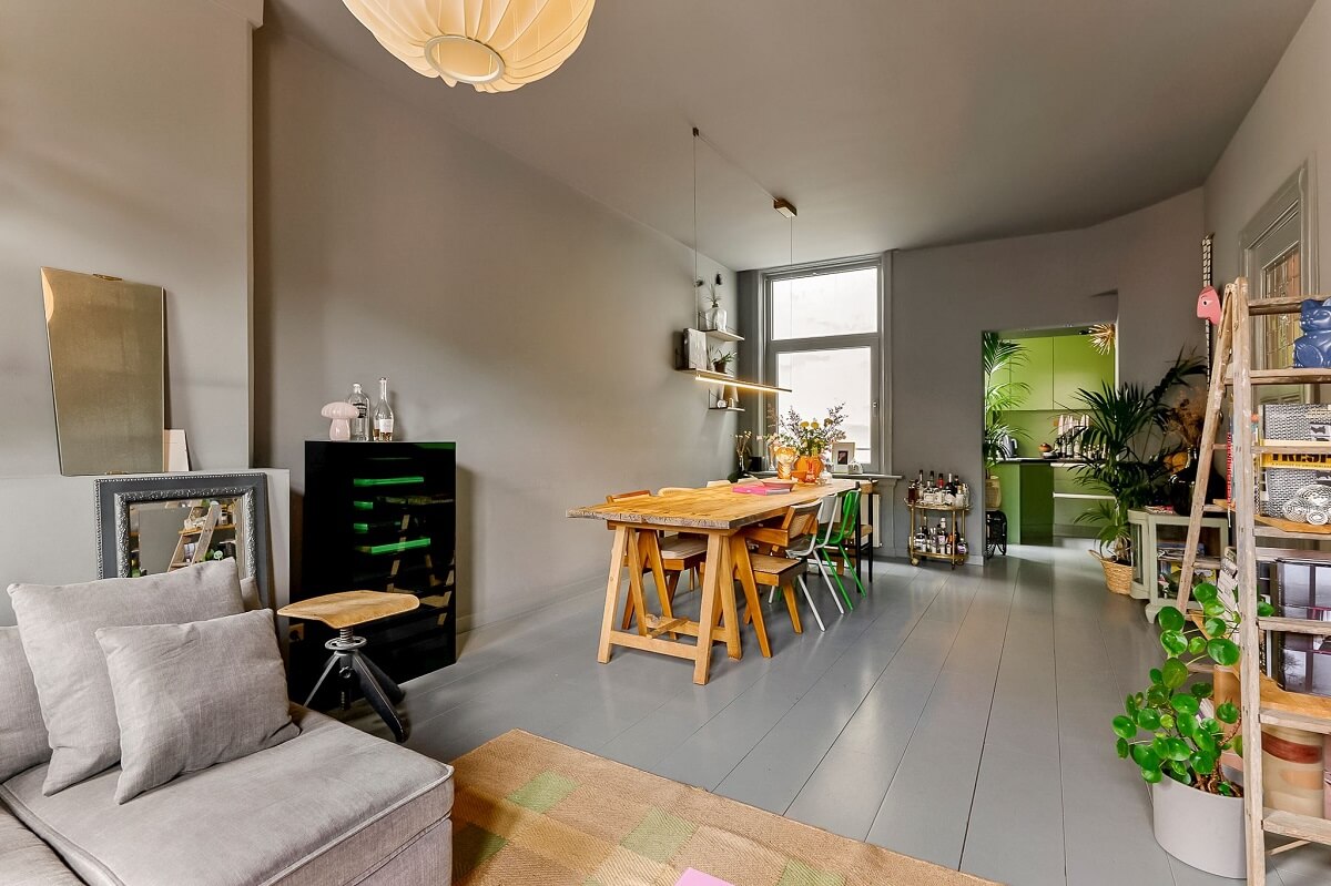 An Amsterdam Apartment with Surprising Bold Color Accents 3 living room with gray walls ceiling and floor