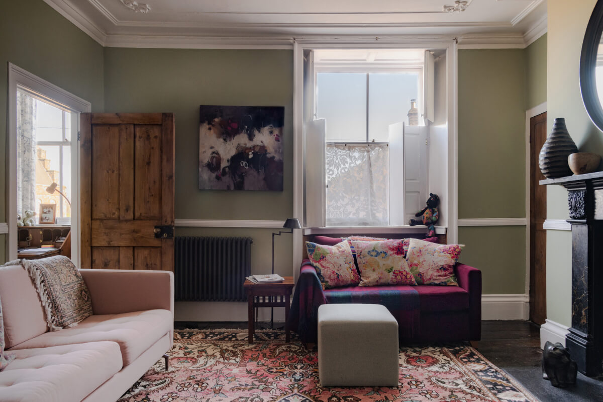 A Georgian English House Restored To Its Former Glory 12 living room with large rug and fireplace